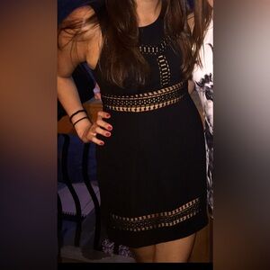 Uniq Black Crochet Cut-Out Mini Dress. Very flattering